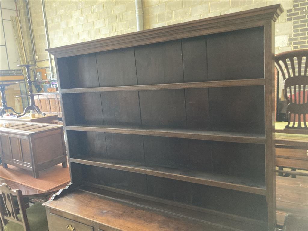 A mid 18th century oak dresser, length 154cm, depth 39cm, height 190cm